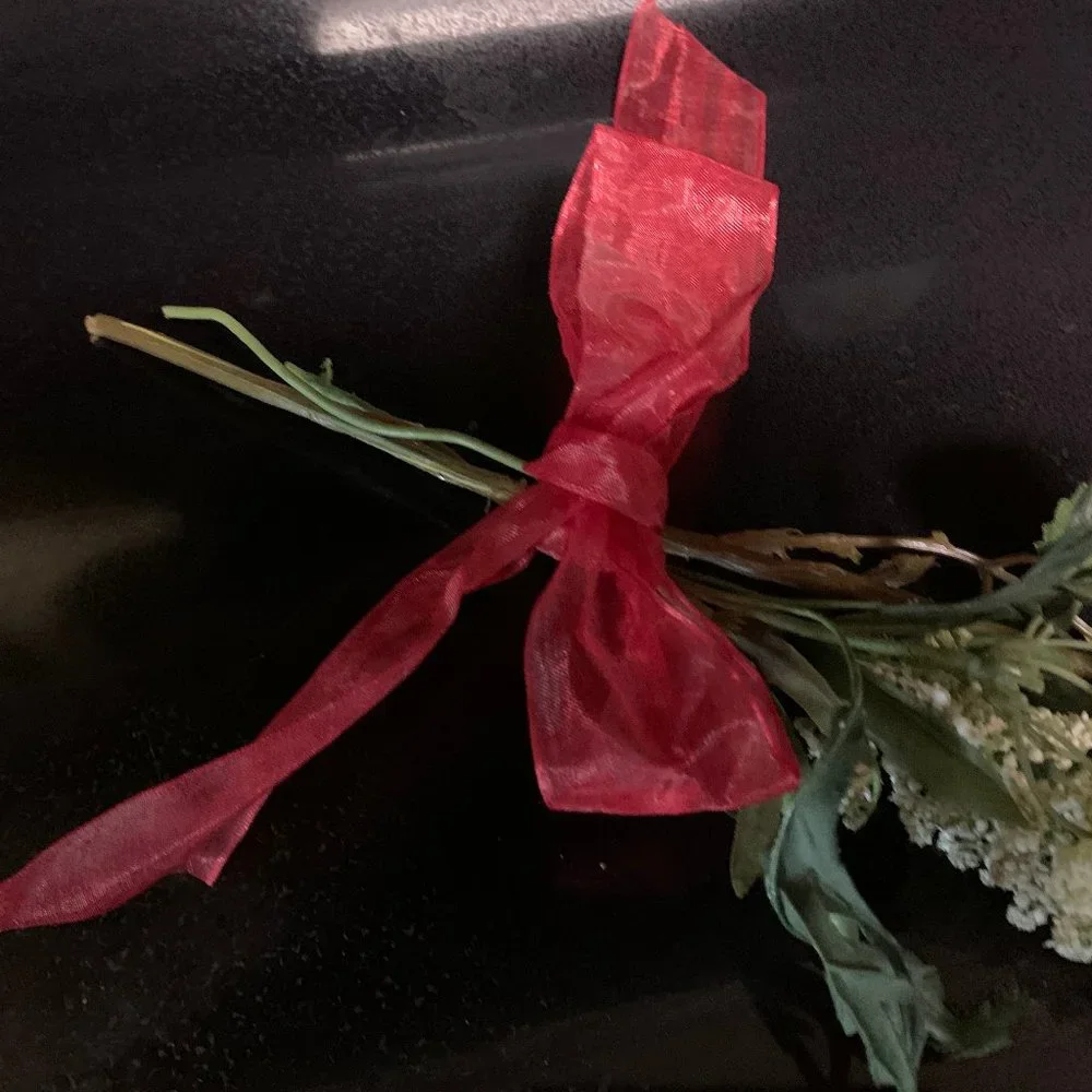 One Red rose with baby's breath and bow